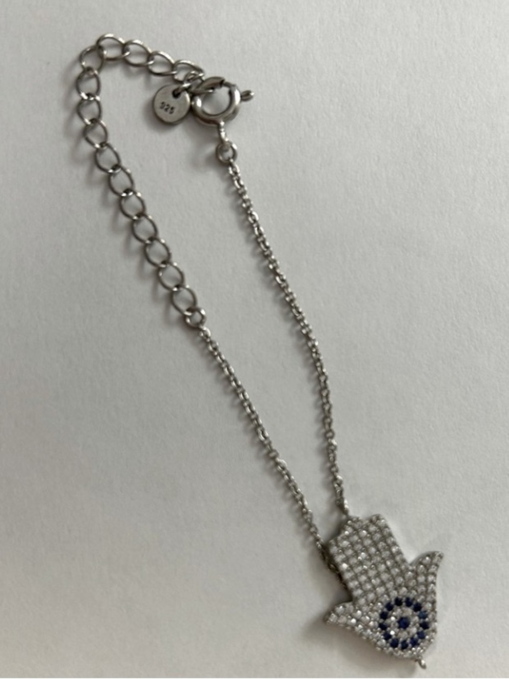 Sterling Hamsa Hand Bracelet with Blue Accent